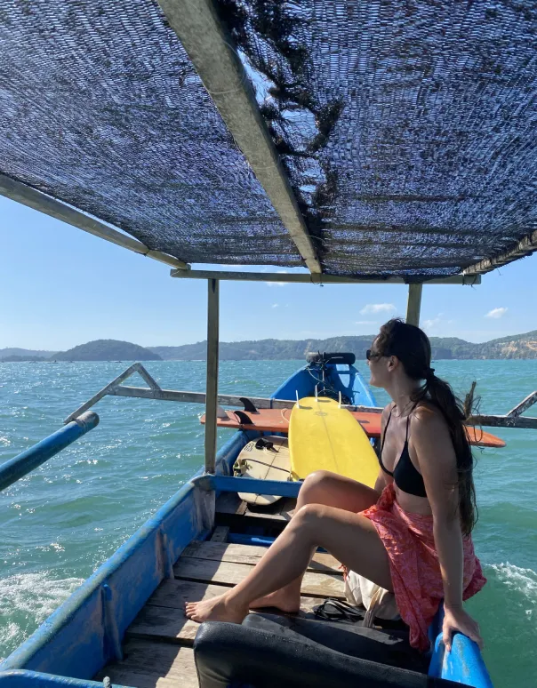 Sofia on a boat in Indonesia